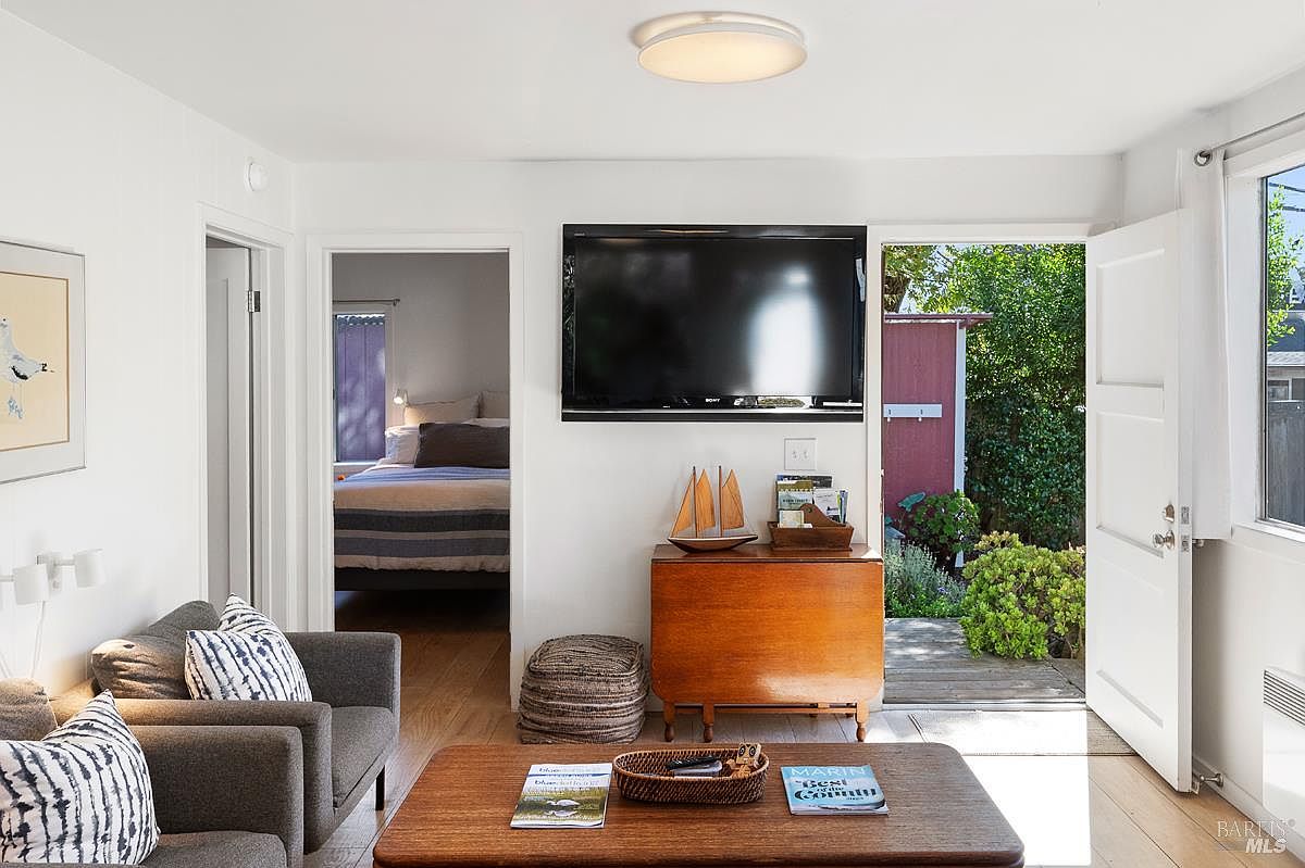 Living room and bedroom doorway, wood floors